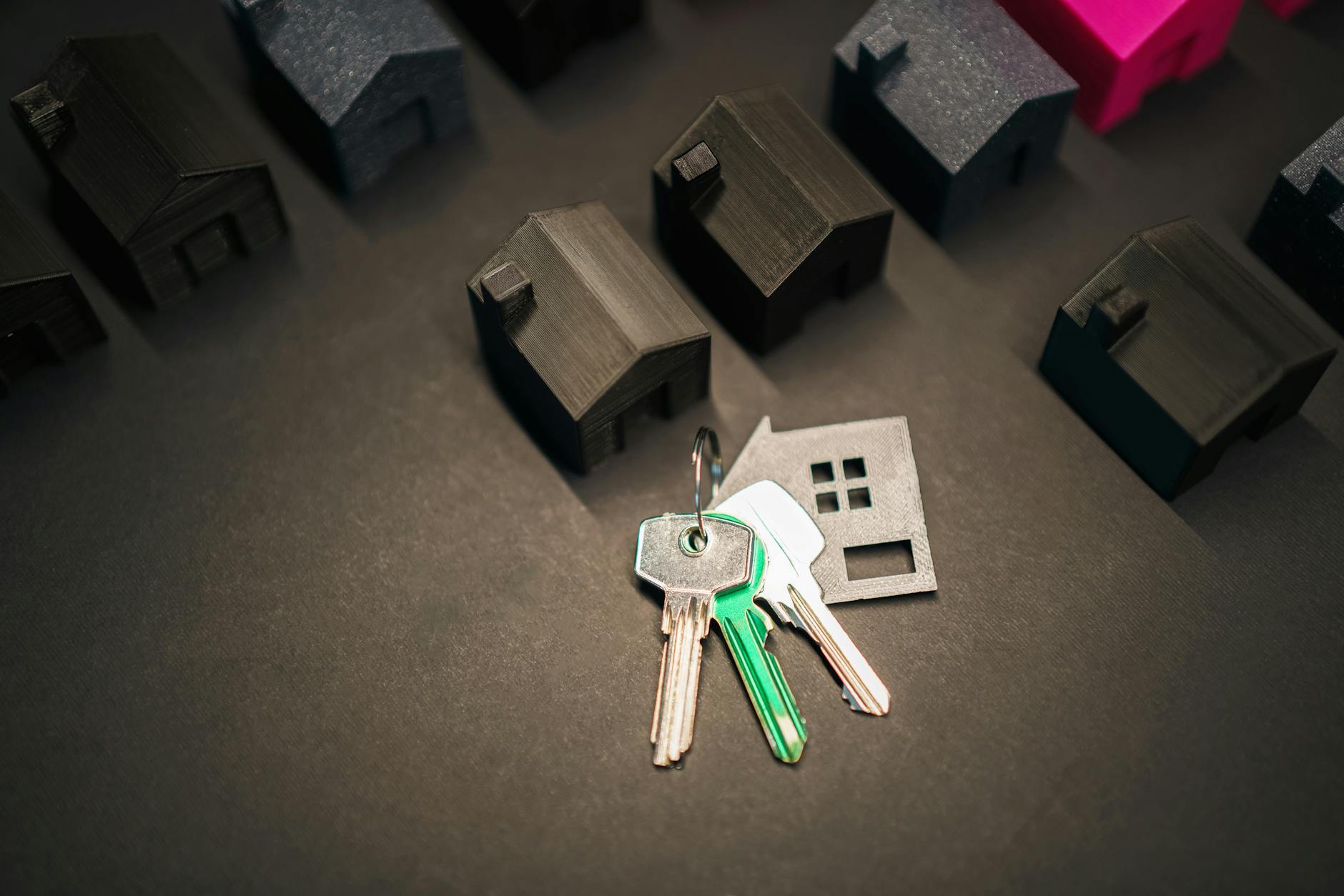 real estate concept with key and house models